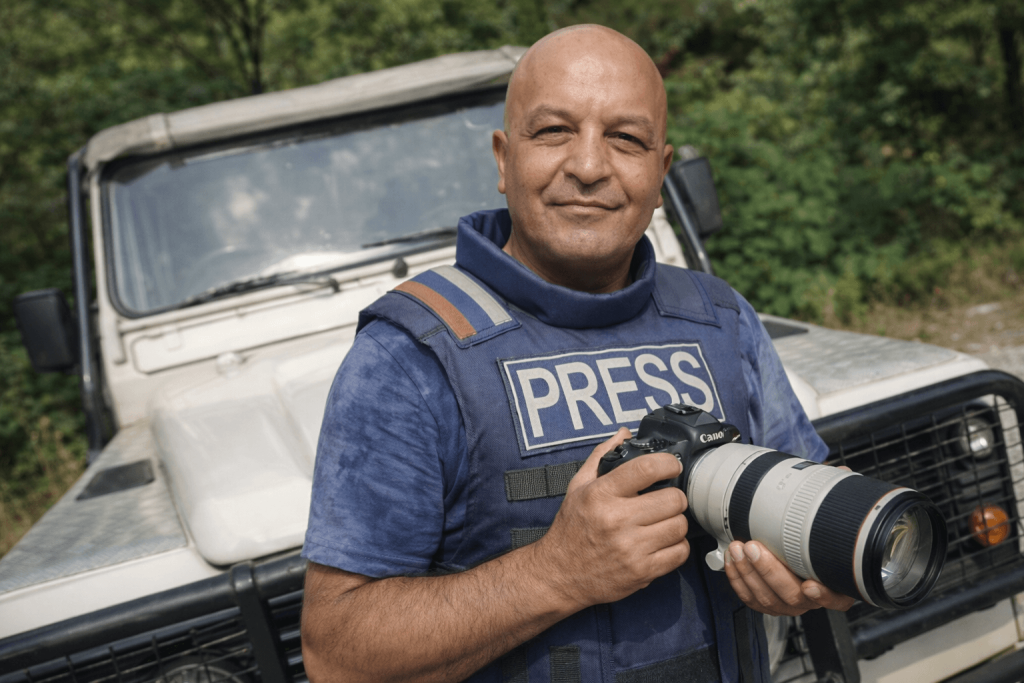 Bourbiza Mohamed working with professional camera equipment